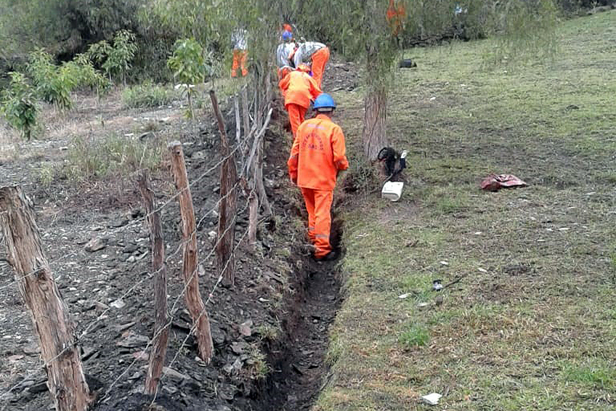 Ditch digging for water pipes